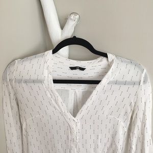 White blouse with arrows